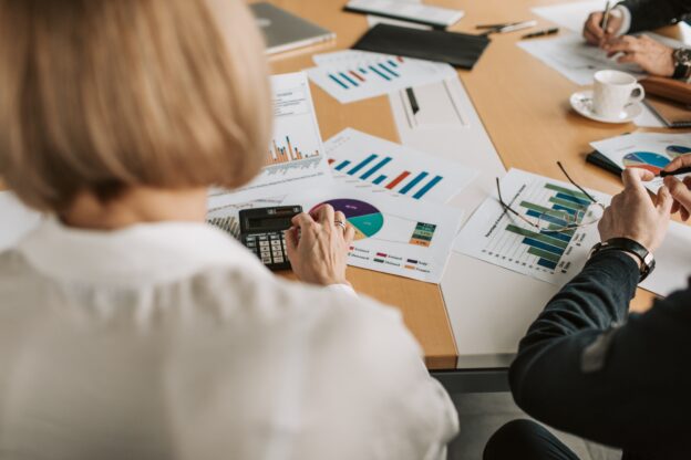 People discussing retirement financials with their financial advisor