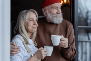 A older couple drinking coffee during their retirement