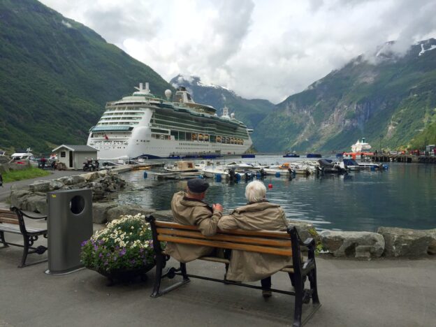 Older couple looking out over lake