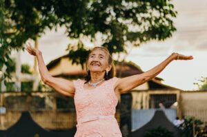 Woman celebrating her canceled life insurance policy