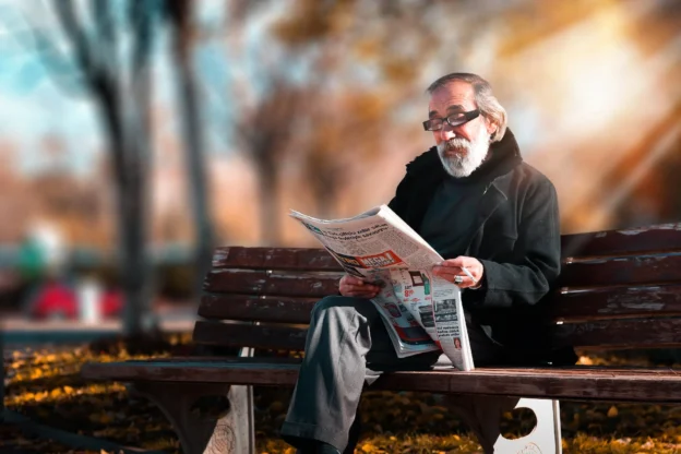 Man sitting on park bench